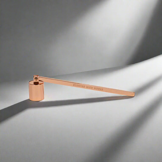 candle wick snuffer in rose gold
