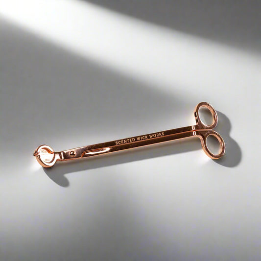candle wick trimmer in rose gold