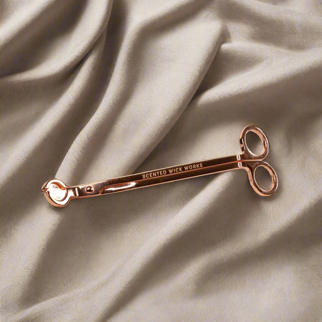 candle wick trimmer in rose gold