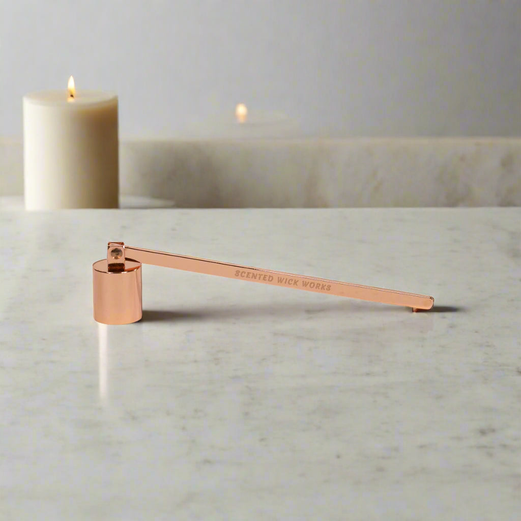 candle wick snuffer in rose gold